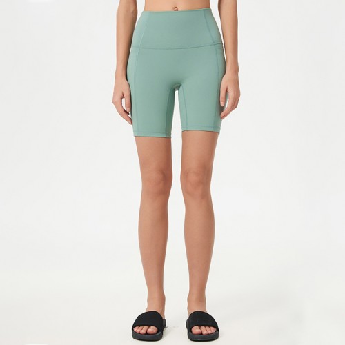 High Waisted Women's Yoga Shorts with Side Pockets and Butt Lifting Design